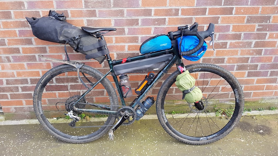 A gravel bike, fully laden with gear.